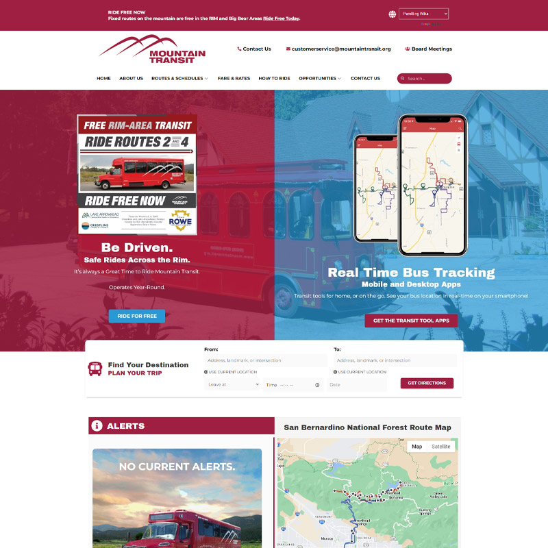 The redesigned Mountain Transit homepage from 2021, with a "Ride Free Now" banner, a real-time bus tracking promotion showing phone screenshots, a "Find Your Destination" trip planner, an alerts panel, and an interactive route map.